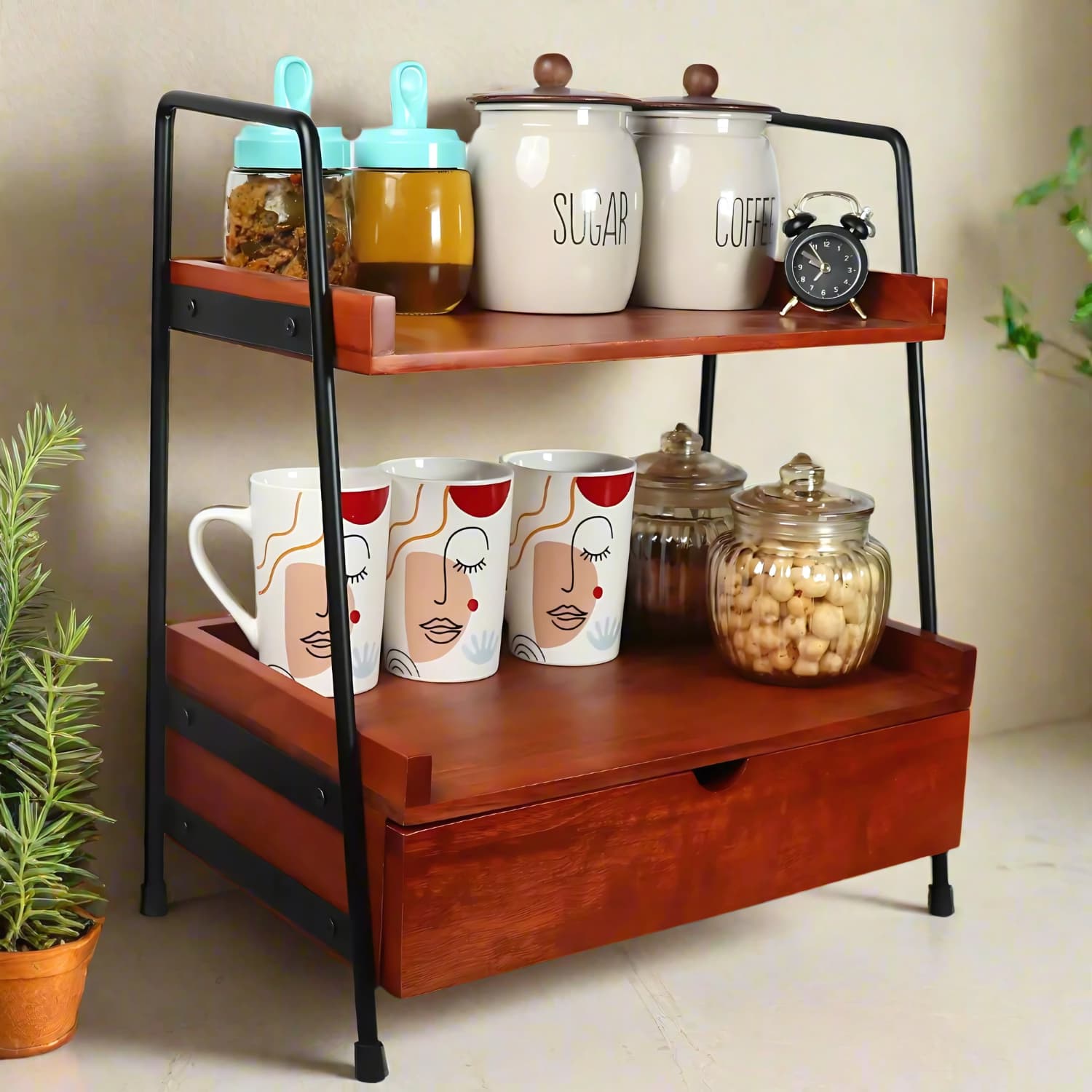 Loosebucket's Xylostow Premium Woden kitchen organizer displaying kitchen jar ,coffee mug and small table watch on it.